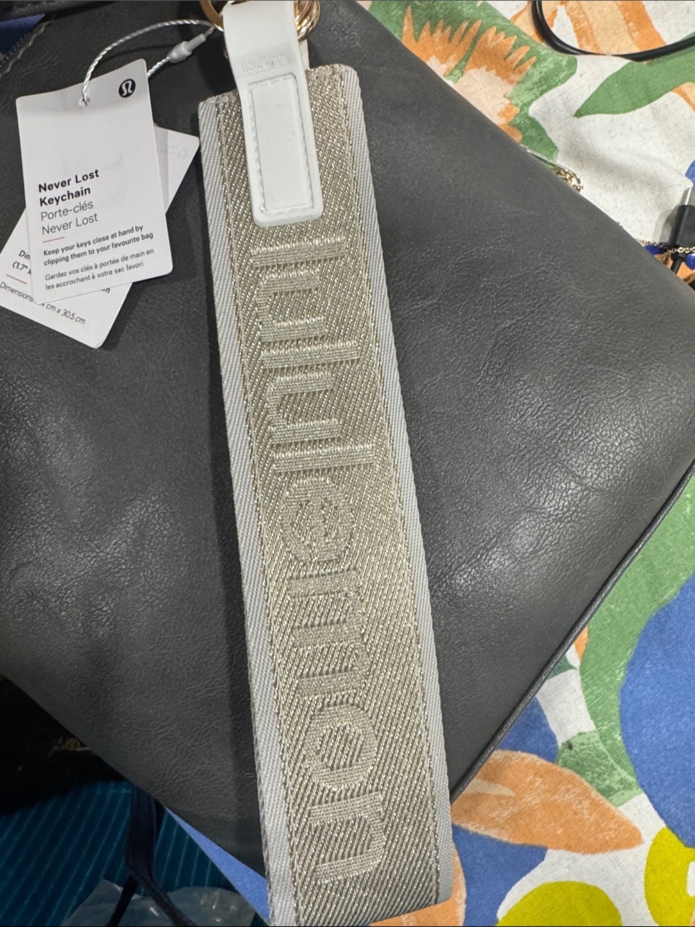 lululemon athletica Never Lost Keychain Strap in Metallic Gold and White